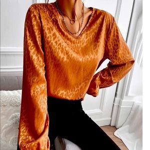 Womenโs V neck blouse